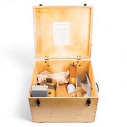 Pair of mid 20th century Russian Helios PNB-2 military observation binoculars, no. 40149, each 'Big Eye' lens 13cm in diameter, with 80 degrees vertical elevation, 360 degrees rotation, spirit level to centre of body, contained in wooden stow case with service manual, canvas cover, two lens caps, a small latched metal tin containing lenses and accessories and on adjustable wooden tripod painted green with pointed feet,  with a small latched metal tin containing eight lenses and accessories