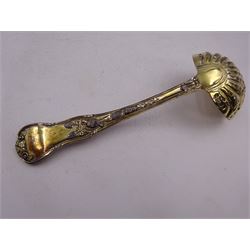 Victorian silver-gilt sugar sifting spoon, with gilded pierced shell shaped bowl, the handle decorated in relief with classical greek figures amongst fruiting vines, hallmarked Henry John Lias & James Wakely, London 1874,  L16cm, contained within tooled leather silk and velvet lined fitted case