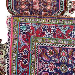 Persian rug, blue ground field with pale lozenge, decorated all-over with Herati motifs and stylised plant motifs