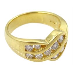 18ct gold channel set fourteen round brilliant cut diamond crossover ring, Edinburgh assay mark, total diamond weight approx 1.00 carat