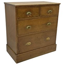 Victorian pitch pine chest, rectangular top over two short and two long drawers, fitted with brass cup handles, on skirted base