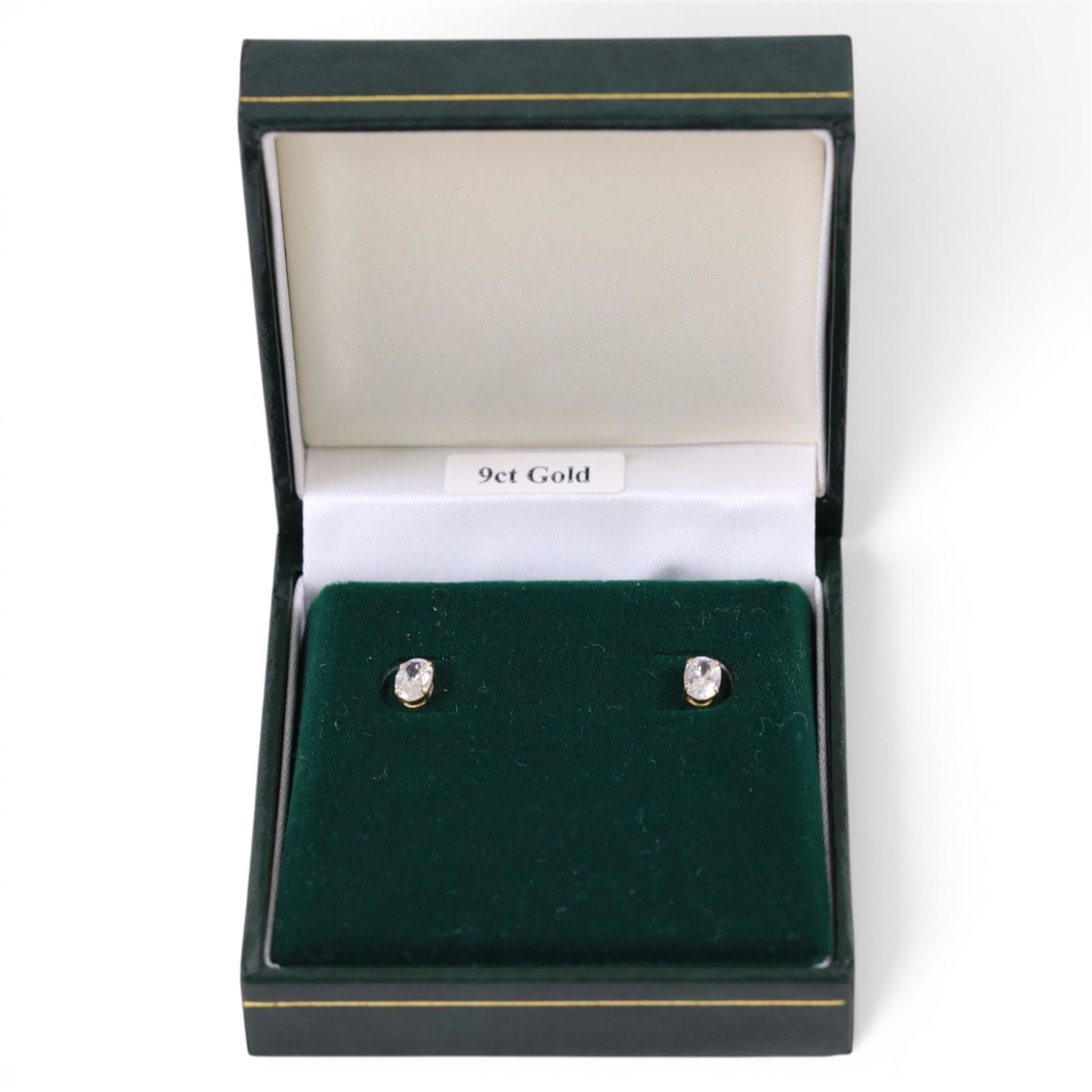 Pair of 9ct gold cubic zirconia stud earrings, boxed