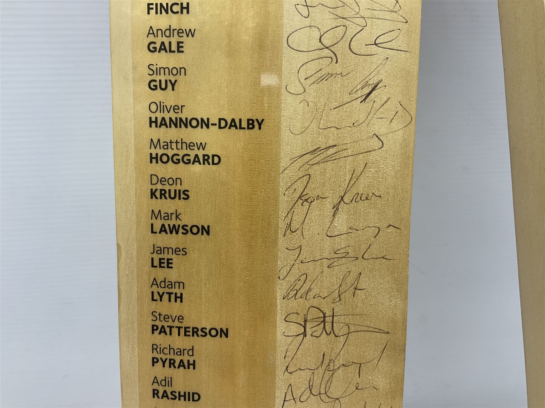 Two signed Yorkshire County cricket bats, from 2007 and 2008 seasons, bearing signatures including Darren Gough, Jason Gillespie, Younus Khan, Michael Vaughn and Tim Bresnan, etc