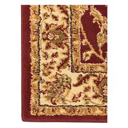 Contemporary Dunelm 'Legacy' ground rug, the field decorated with symmetrical scrolling foliate and floral motifs, bordered by an ivory band with repeating floral designs interspersed with leafy branches, inner guard stripe with fine linear patterning