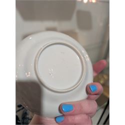 Pair of Chinese blue and white tea bowls, one with cover and four saucers, depicting two figures on a boat at sea, tea bowl H7cm