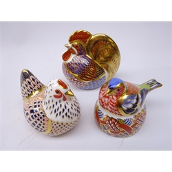  Three Royal Crown Derby paperweights: Chaffinch Nesting designed exclusively for the Royal Crown Derby Collectors Guild dated 1997, Imari Cockerel dated 1992 and Hen dated 1990, gold stoppers (3)  