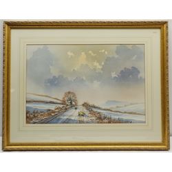 I A Gillibrand (British 20th century): Winter Scene with Sheep, watercolour signed 36cm x 53cm