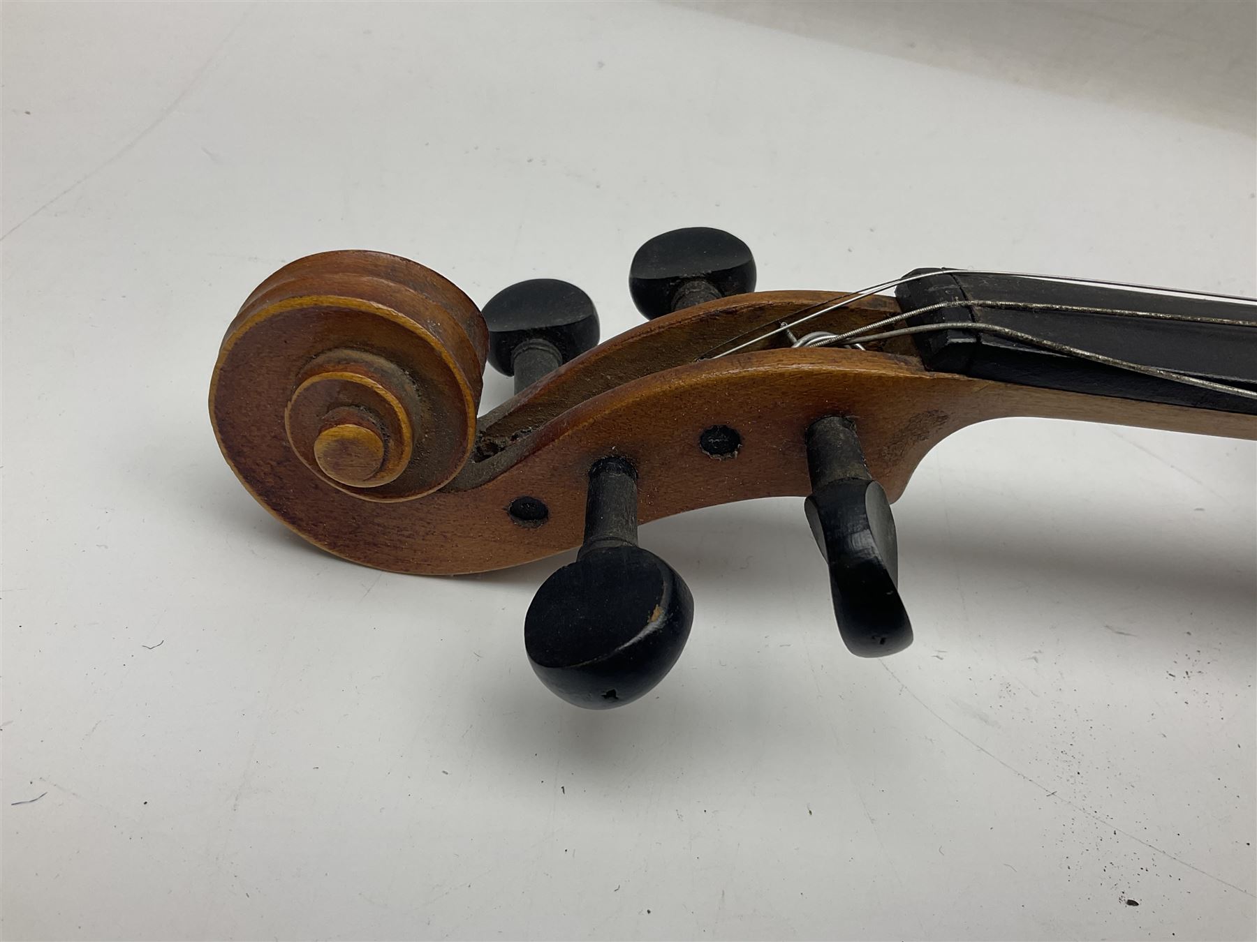 Saxony (?) violin c1950 with 36cm two-piece maple back and ribs and spruce top; bears label 'The Maidstone School Orchestra Association' L59cm overall; and 1950s Czechoslovakian violin for restoration; both in carrying cases (2)