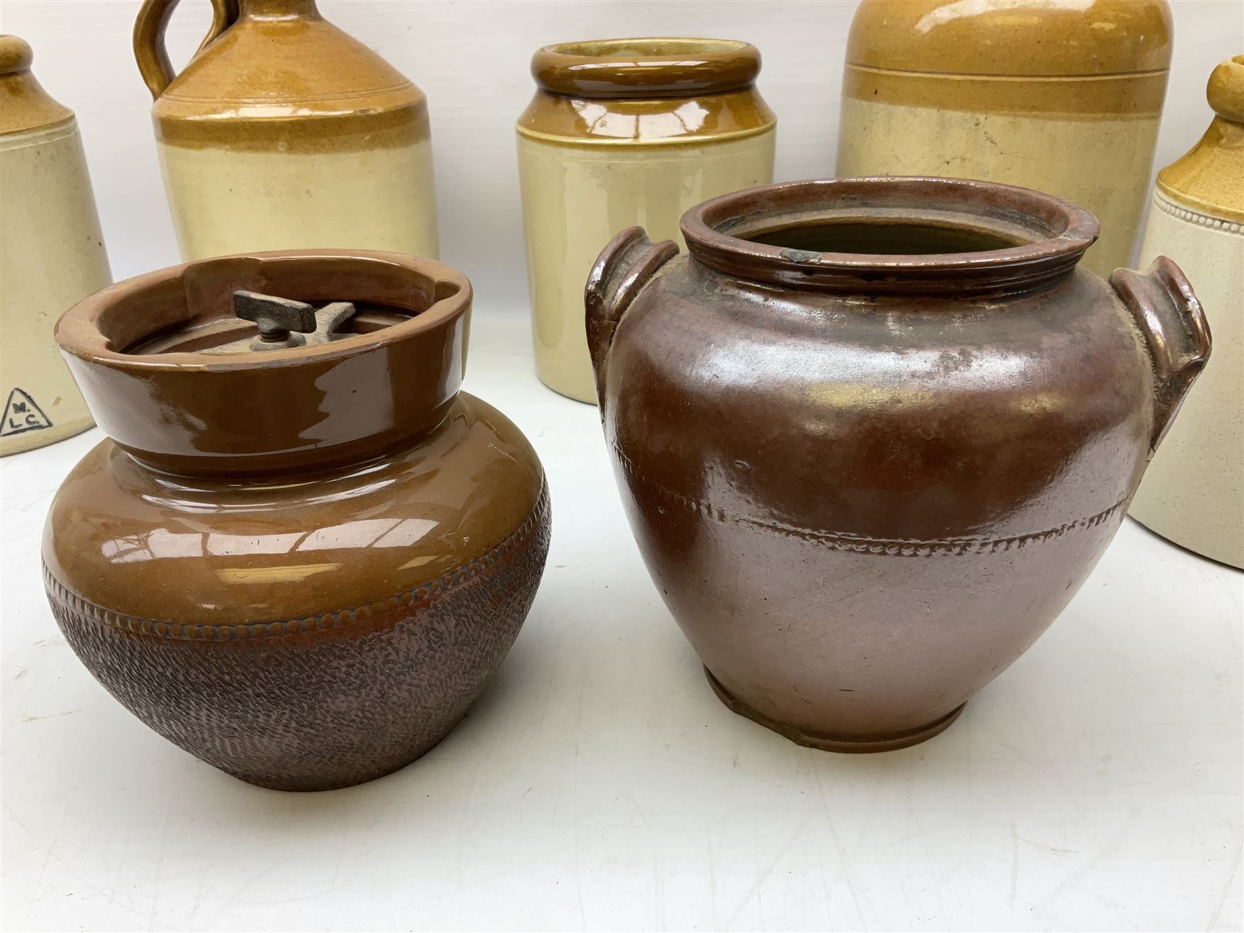 Quantity of salt glazed stoneware flagons, two tone jars and jug etc, to include some with impressed marks and labels, largest H26cm