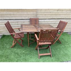 Winchester Collection - 20th century teak garden table drop-leaf table and set four matching folding chairs - THIS LOT IS TO BE COLLECTED BY APPOINTMENT FROM DUGGLEBY STORAGE, GREAT HILL, EASTFIELD, SCARBOROUGH, YO11 3TX
