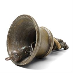 19th century Chinese bronze censer with loop handles and on shaped supports D13cm and an Asian bronze bell H17cm