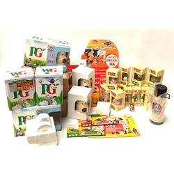  Wallace & Gromit - PG Tips Tea merchandise comprising six Thermo colour changing mugs, two in promotional packaging, two tea tins two Typhoo Tea mugs, seven condiments (three unboxed), five figures, shop poster and promotional packaging  thermos flask and mug Jacobs Crackers - two boxed sets of four cheese plates with knife, shop display card, tin and promotional packaging  