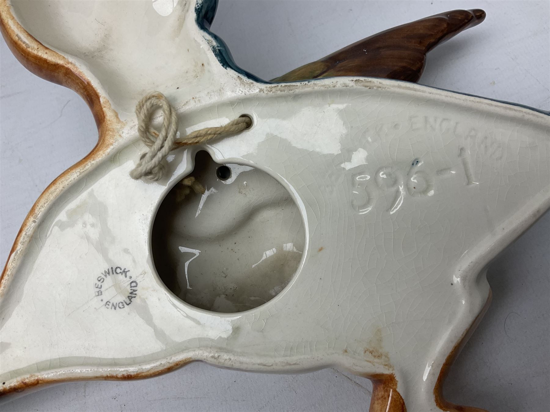 Set of five Beswick graduated wall mounting figures of flying ducks, models from 596/0 to 596/4, largest L29cm