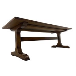 Dorset Oak - large refectory dining table, rectangular plank top, raised on shaped end supports with sledge feet, united by stretcher