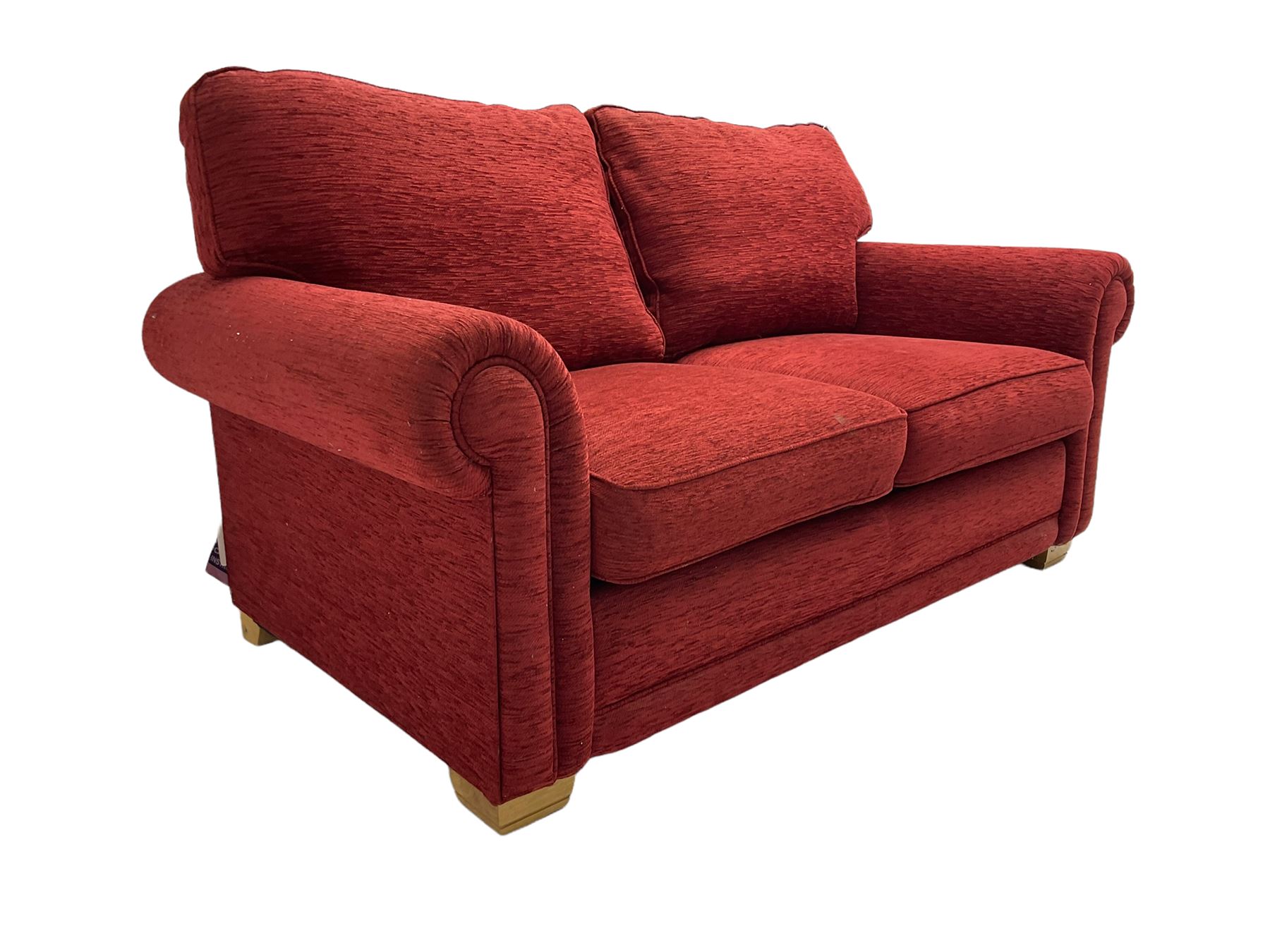 Two seat metal actions sofa bed upholstered in red cover
