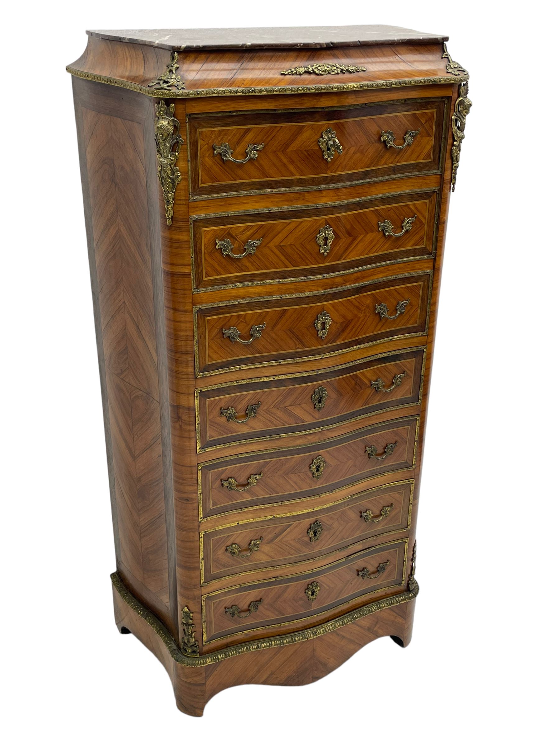 Mid-20th century Louis XVI design Kingwood and walnut secretaire à Abattant, shaped serpentine form with dark rouge variegated marble top, the fall front disguised as three drawers enclosing birdseye maple interior with shelf, drawers and writing surface, four functioning drawers below, decorated with cast gilt metal mouldings and mask cartouches, on skirted base with egg and dart moulded gilt metal edge