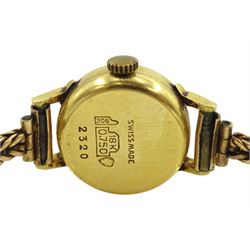 Atlantic ladies 18ct gold manual wind wristwatch, on 9ct gold bracelet, both hallmarked