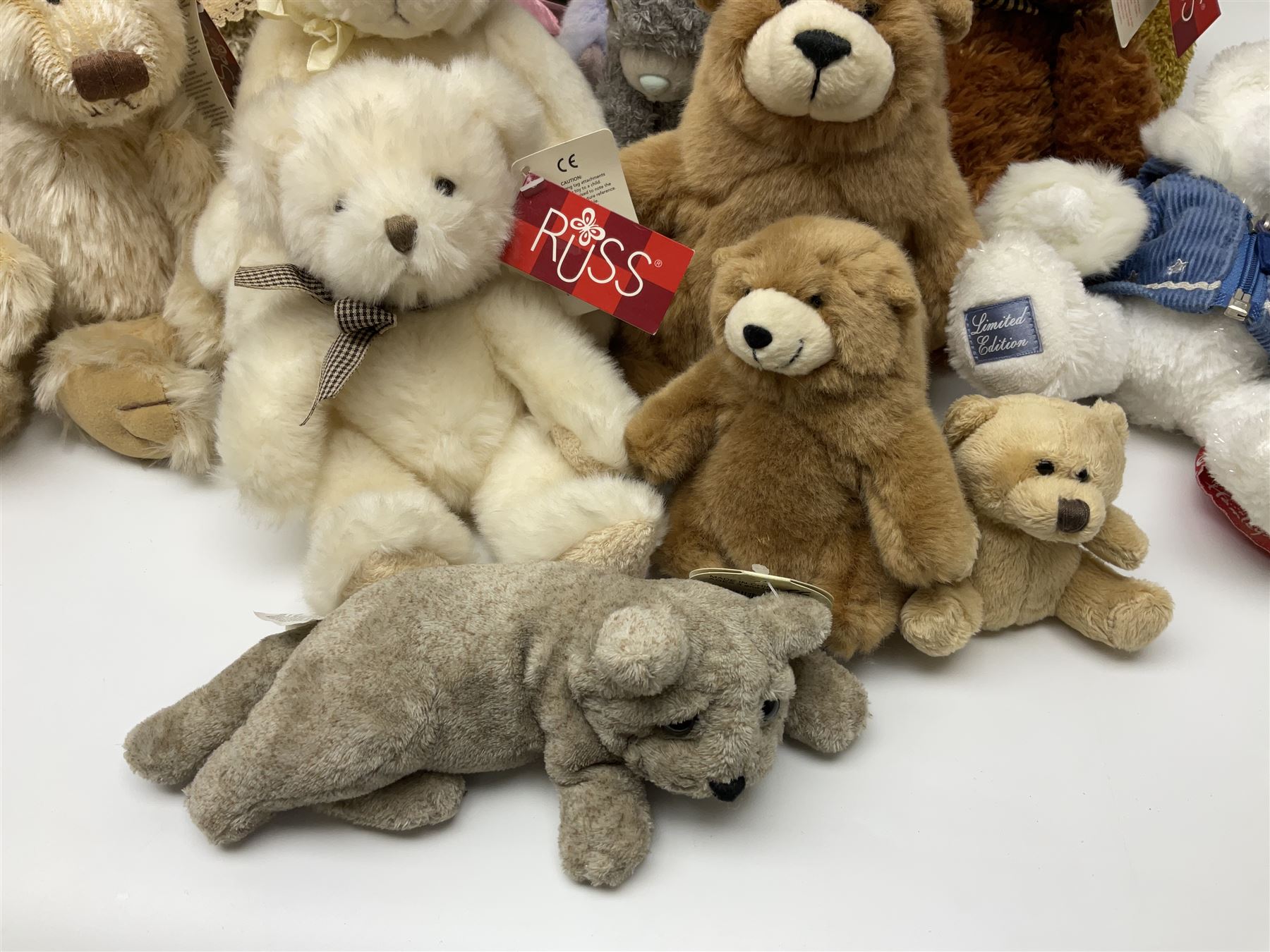 Eighteen Russ teddy bears including Ariella, Chloe, Spencer and Desmond,  mostly with tags, together with six other soft toys, tallest H42cm (24)