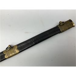 Five-ball spadroon sword with 78.5cm fullered steel blade and brass hilt with fluted swollen grip; in brass mounted leather scabbard, the locket with traces of the makers name John Knubley 11 Charing Cross L97.5cm overall