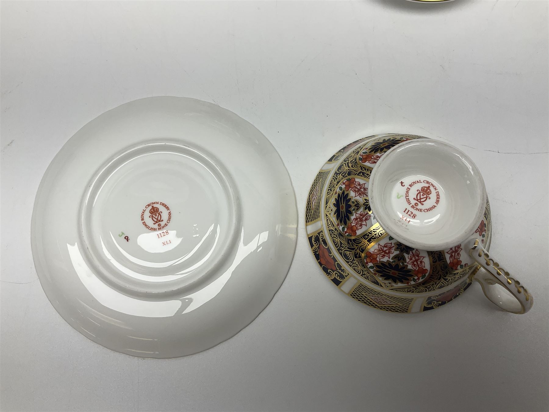 Royal Crown Derby Old Imari pattern miniature vase, coffee can and saucer, teacup and saucer and plate, all with printed mark beneath, vase H8cm 