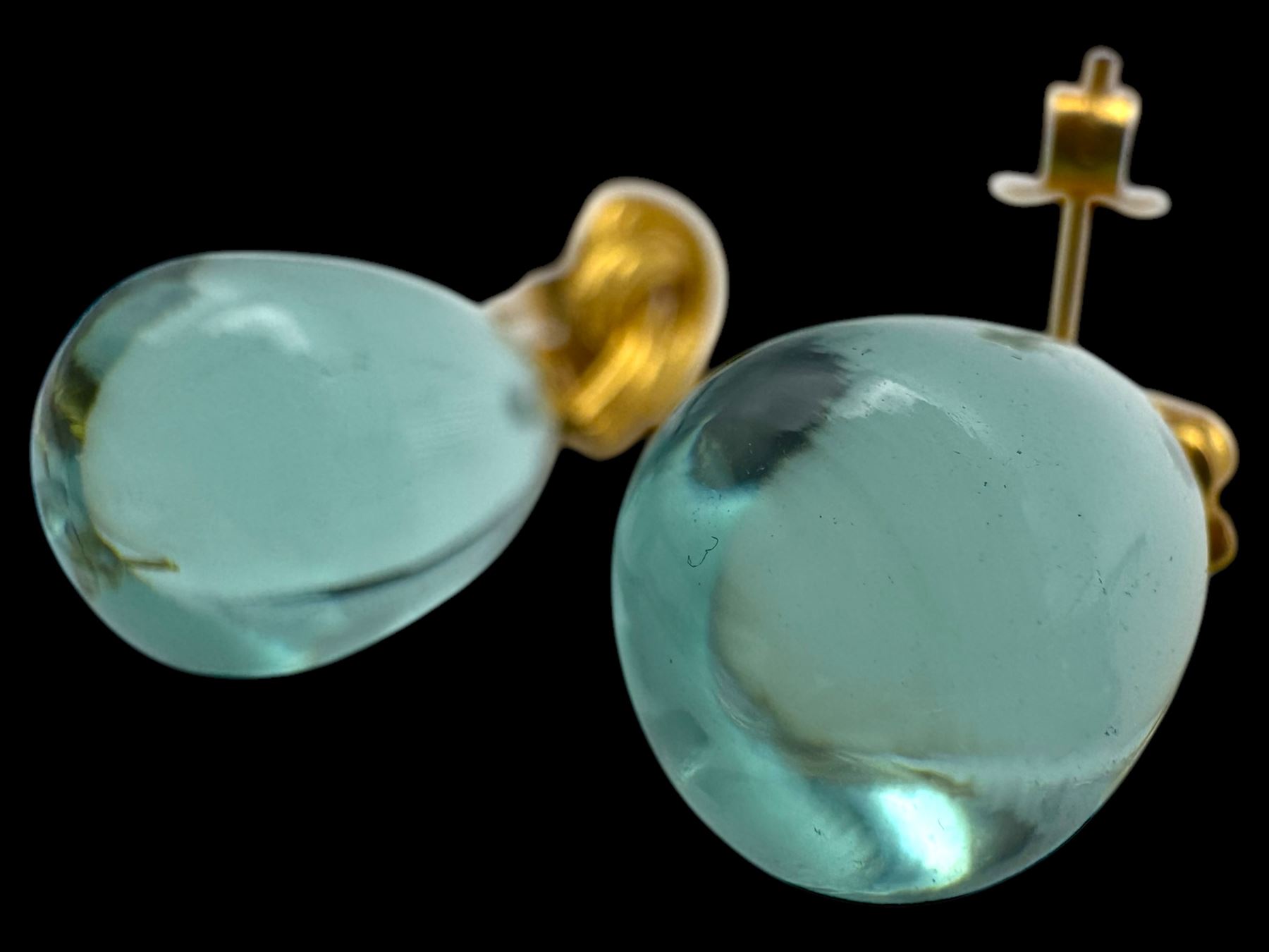 Six pairs of silver earrings, including opal pendant earrings and a pair of moonstone hoop earrings