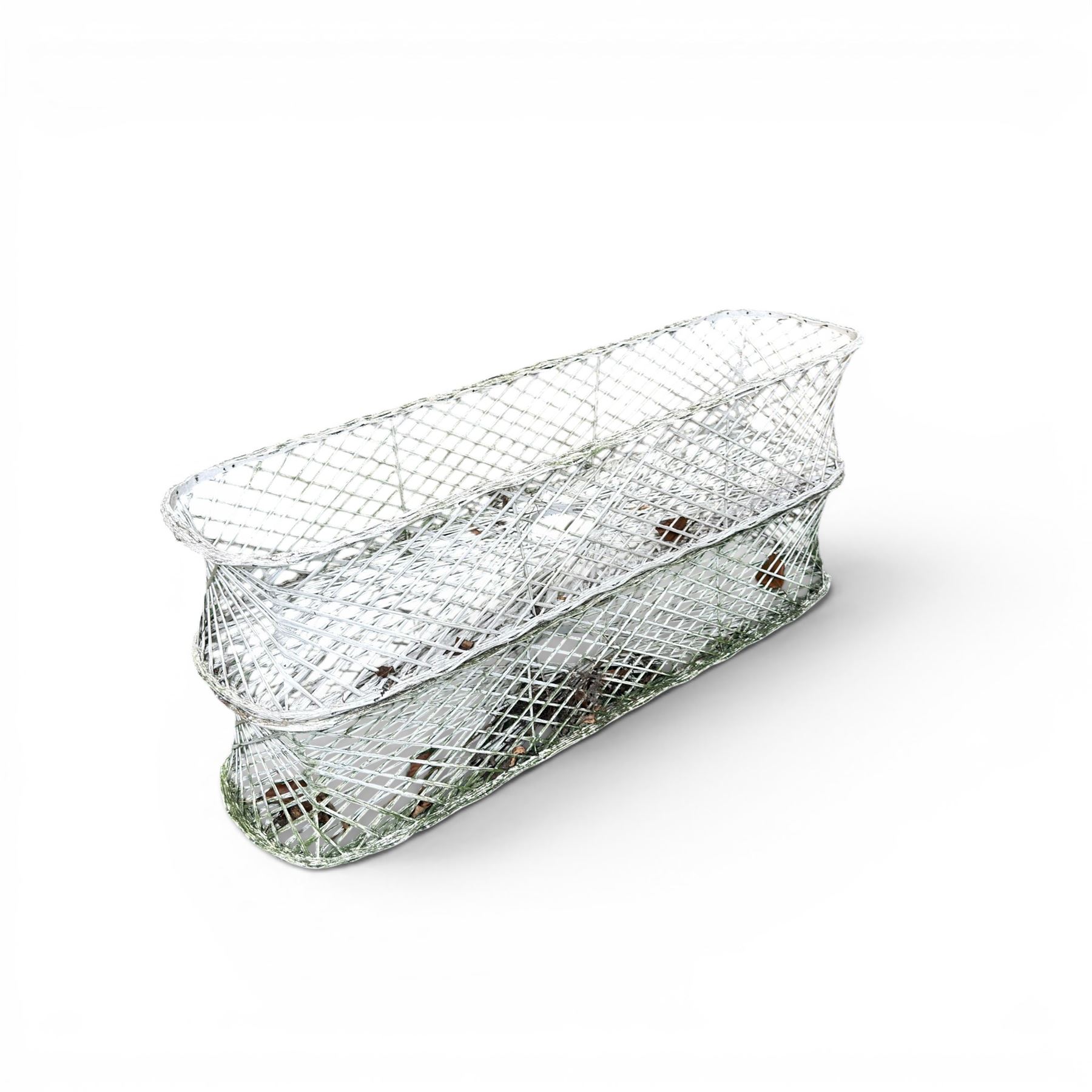 Four early 20th century French painted wicker garden planters, rectangular lattice form with shaped ends