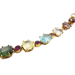 Edwardian gold multi gem set necklace, comprising of cushion, round and oval cut topaz, sapphire, tourmaline, zircon citrine and garnet  
[image code: 3mc]