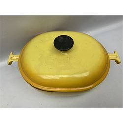 Quantity of Le Creuset cast iron kitchenaelia comprising yellow oval lidded casserole dish, size 29, Volcanic Orange sauce pan, size 18, and blue lidded casserole dish, size 27, together with set of three graduating Invicta red lidded twin handled lidded dishes