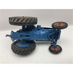 Chad Valley - two unboxed and playworn large scale Fordson tractors - No.9235 Fordson Major Tractor, dark blue diecast body, orange wheels, crank handle clockwork mechanism and 'Firestone' rubber tyres; and No.M59 New Fordson Major Tractor, blue diecast body, tinplate hinged bonnet, orange wheels and clockwork motor contained in rear wheel hub (2)