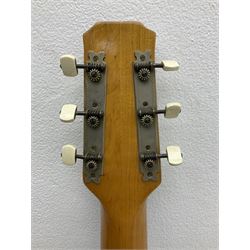 1950s acoustic guitar with f-holes and pickguard L105cm; black fur lined hard carrying case