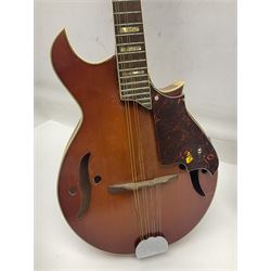 Eastern eight-string mandolin with sunburst finish and mother-of-pearl inlay L68.5cm; and another Harmony mandolin with cracked headstock (2)