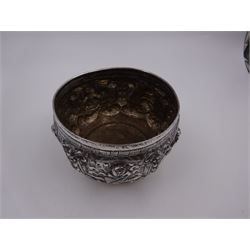 Burmese silver bowl, embossed with figural panels, C scrolls and floral decoration, H8.5cm