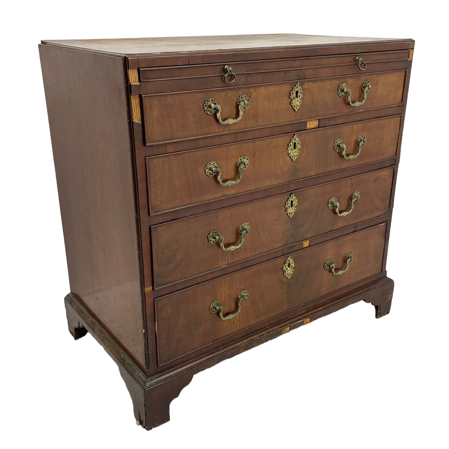 George III mahogany chest, banded caddy top with moulded edge, brushing slide over four graduating cock-beaded drawers, ornate cast gilt metal handle plates and escutcheons, swan neck handles cast with dolphins, shells and C-scrolls, lower moulding over bracket feet