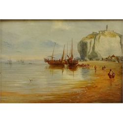 Masted Boats Moored in Whitby Harbour, watercolour attrib. Frank Rousse (British fl.1897-1915) 20cm x 20cm and Boats Unloading on the Shore, 19th century oil on board signed and dated 1879 by J W Shepherd 15cm x 22cm (2)   