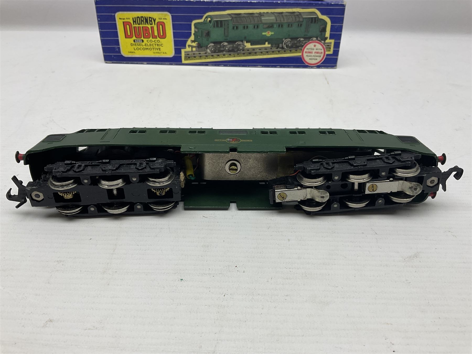 Hornby Dublo - three-rail - Deltic Type Diesel Co-Co locomotive with instructions and guarantee; and Class 20 1000 B.H.P. Bo-Bo Diesel Electric locomotive No.D8000; both in BR green; and each in original blue striped box (2)

