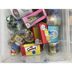 Large quantity of The Simpsons merchandise and memorabilia, to include Micro Scalextric, mugs, jigsaw, bottle openers, solar pal, glasses, etc, many boxed