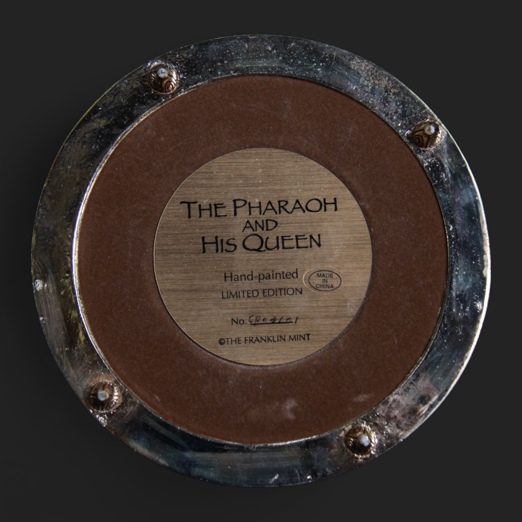 Franklin Mint seven Egyptian models under glass domes, including The Pharaoh and his Queen, The Mask of Tutankhamun, The Sacred Bast Cat, The Mighty Sun God Ra Harakhty etc, largest H22cm 