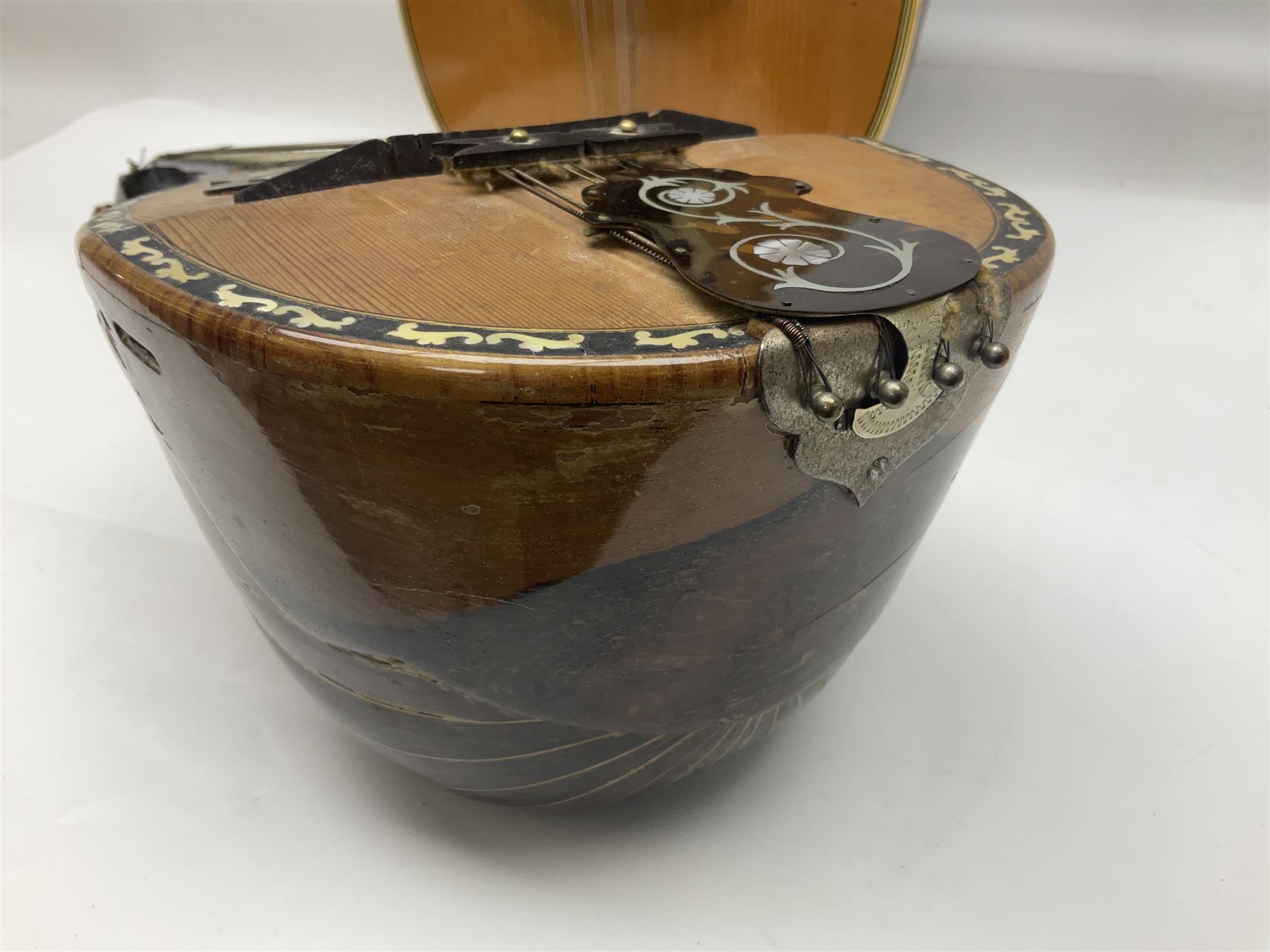 Italian bouzouki type long necked mandolin with segmented lute back and spruce top with tortoiseshell style panels; bears label 'Miroglio & Figli Sicilia Catania Italia' L99cm; and Italian lute back mandolin with segmented back and spruce top bearing label for F. De Mureda Napoli (2)