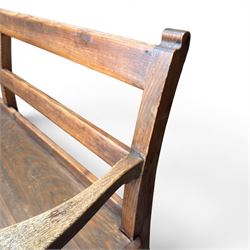 Early 20th century pine and oak bench seat, stained pine rail back frame with shaped oak arms