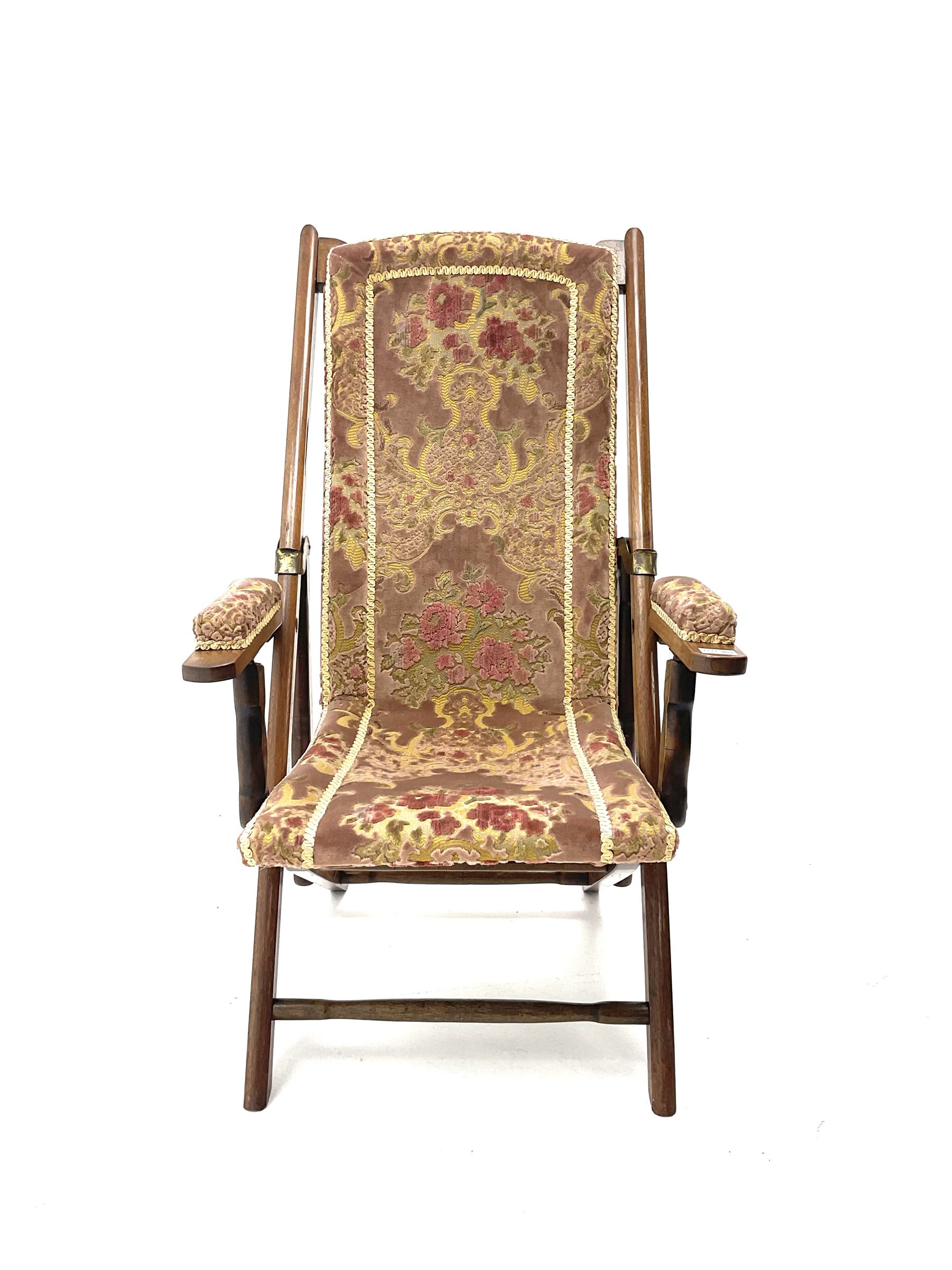 Late 19th century folding campaign chair, upholstered in patterned fabric 