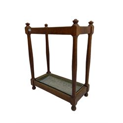 Mid-20th century oak umbrella stick stand,  three division, with metal drip tray, on turned supports