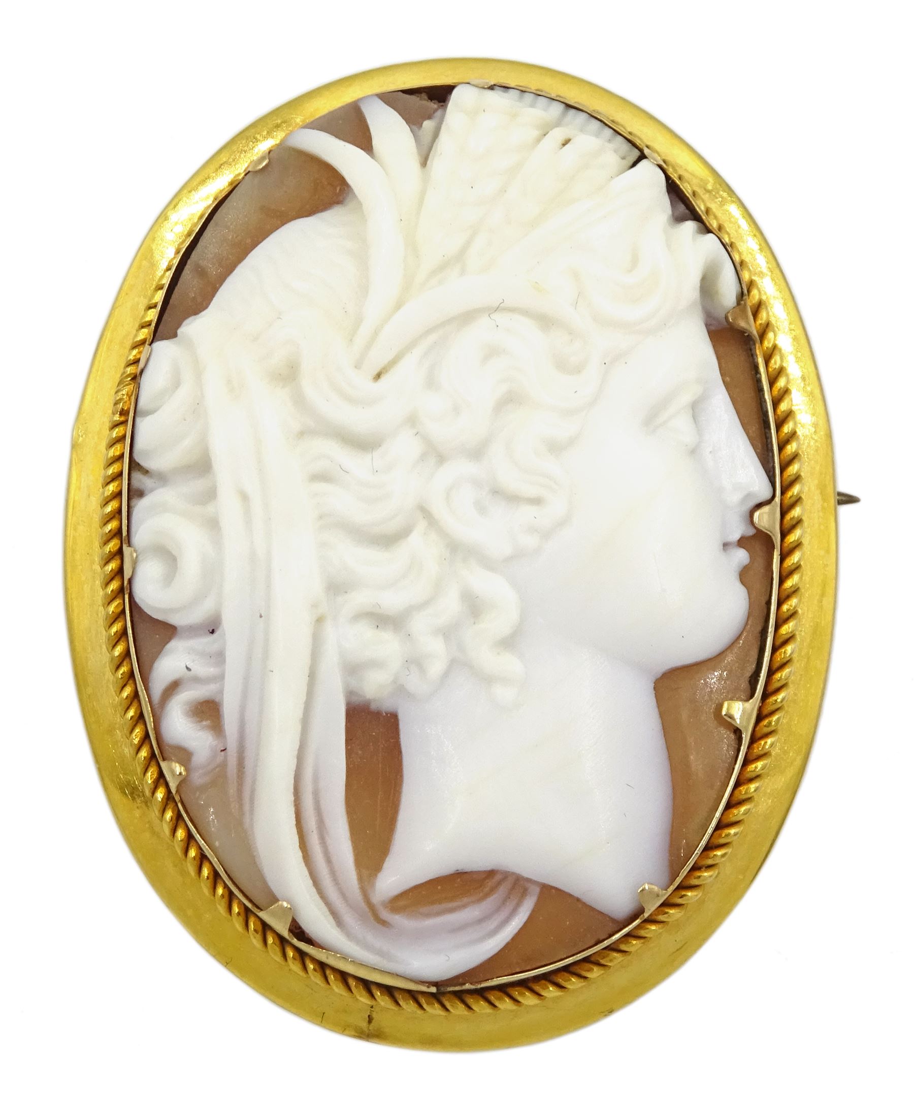 Gold cameo brooch of a classical ladies head, stampe 9ct