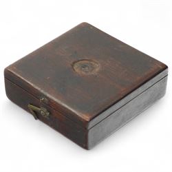 19th Century-magnetic navigational sailors compass in a square mahogany case with a hinged lid and a fully defined paper compass rose register displaying the four cardinal points and 32 quarter wind points, with a magnetic needle and brass recording hand.  