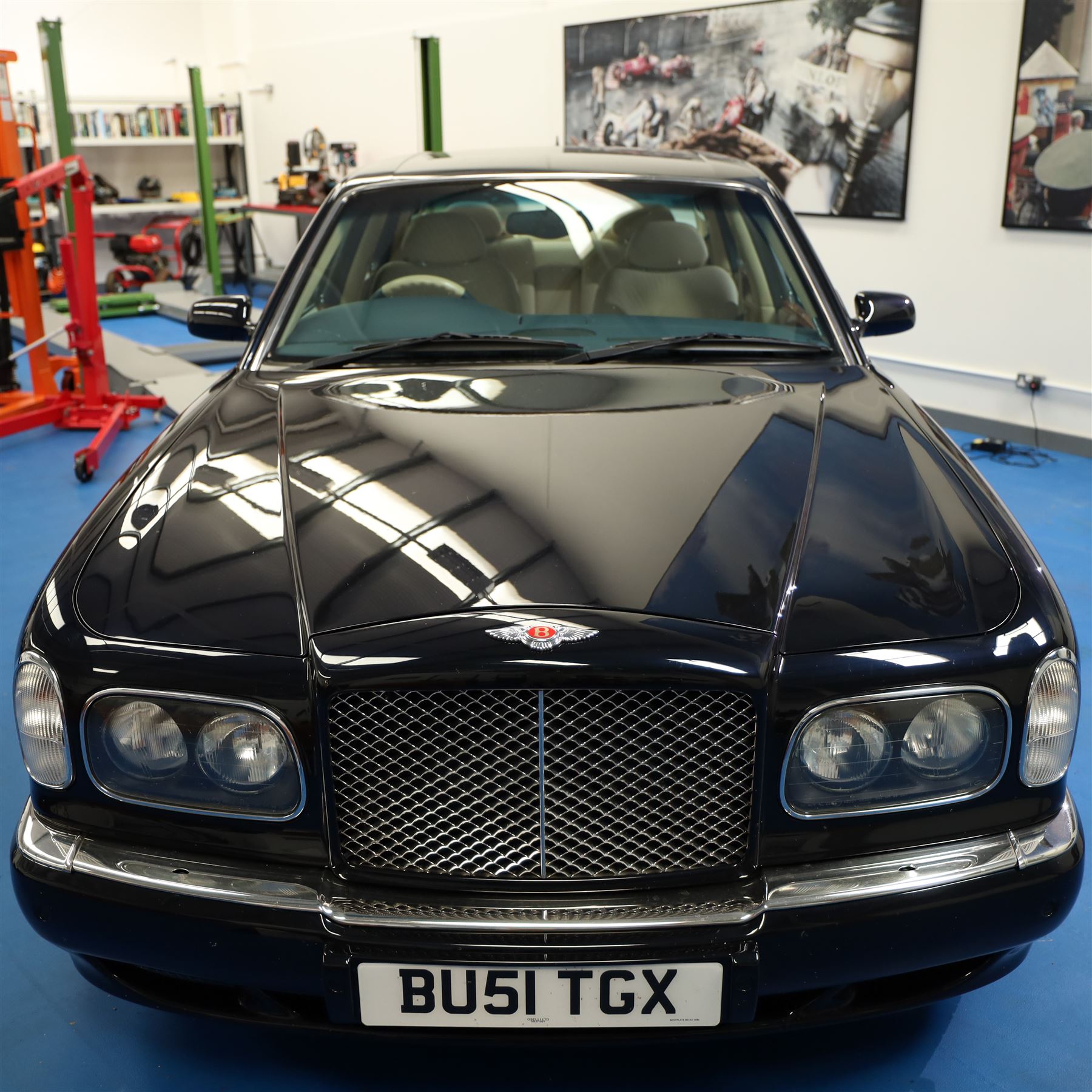 2001 Bentley Arnage Red Label Saloon

Registration: BU51 TGX
Engine: 6.75-litre turbocharged V8 petrol
Transmission: Automatic
Odometer reading: 39,942 miles
Colour: Black Sapphire metallic
Interior: Magnolia leather with burr walnut veneers
Previous owners: 3
V5C: Present
Service history: Good service records

An exceptional Bentley Arnage Red Label Saloon, finished in Black Sapphire metallic, a very dark blue, with a Magnolia leather interior, contrasting dark blue carpets and extensive burr walnut veneers. The car displays an odometer reading of approximately 39,942 miles.

The Arnage Red Label combined Bentley’s renowned 6.75-litre turbocharged V8 engine with automatic transmission, delivering effortless performance in a traditionally appointed luxury saloon. The model is distinguished by its imposing proportions, characteristic Bentley radiator grille and finely crafted interior.

Presented in excellent condition throughout, the bodywork and metallic paint finish appear particularly well preserved, complemented by clean brightwork and the correct Bentley alloy wheels. The engine bay is also notably well detailed.

The interior presents exceptionally well, retaining its Magnolia leather upholstery, polished burr walnut veneers, original factory instrumentation and switchgear. The leather displays only light creasing consistent with careful use.

The car has had three previous owners and is accompanied by good service records.

Features

• 6.75-litre turbocharged V8 petrol engine
• Automatic transmission
• Black Sapphire metallic paintwork
• Magnolia leather interior
• Contrasting dark blue carpets
• Burr walnut veneers
• Electrically adjustable front seats
• Air conditioning
• Factory instrumentation and switchgear
• Bentley alloy wheels
• Right-hand drive
• Odometer reading of approximately 39,942 miles
• Three previous owners
• Good service records
• V5C present

This vehicle forms part of the Estate of the Late John Sills and is offered for sale by the Executors, confirming a genuine reason for sale.