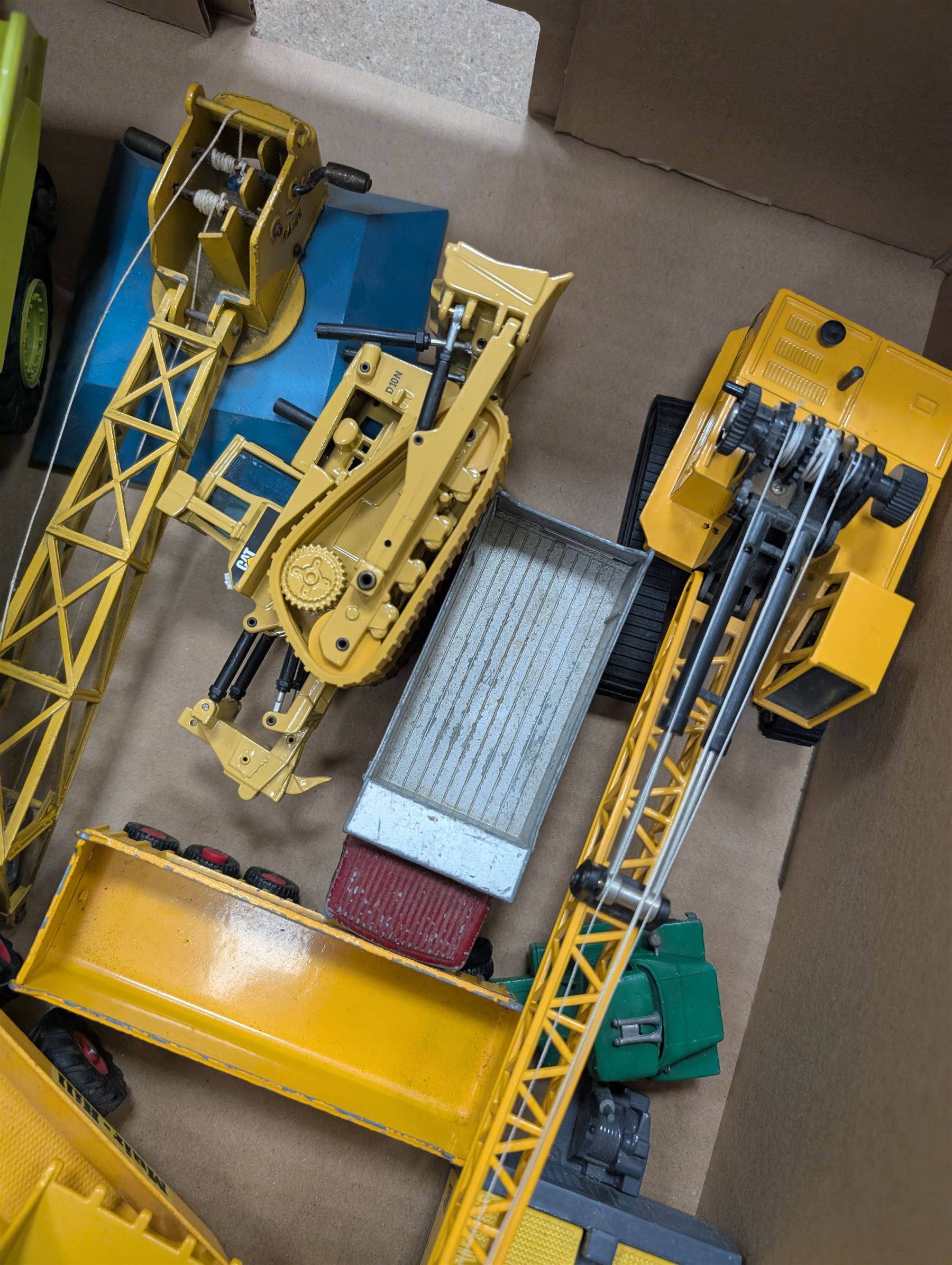 Collection of diecast construction vehicles, including West German NZG Modelle Terex no. 407 and other examples by Joal, Ros, ERTL, etc, all unboxed 