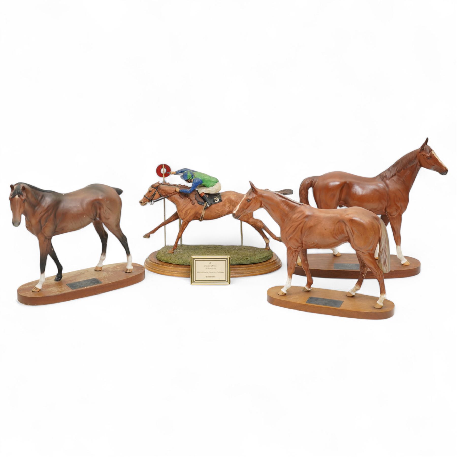 Three Beswick Connoisseur Series racehorses 'Grundy' No.2558, 'The Minstrel' No.2608 and 'Troy' No.2674 and Country Artists racehorse 'First Home' all on wooden plinths (4)