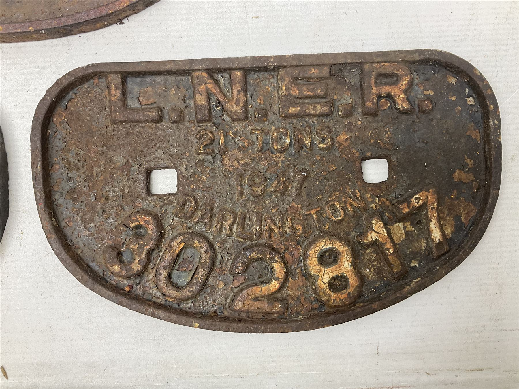 'LNER, 21 tons, 1947, Darlington, 302871' cast iron sign, together with BR D type Wagon plate, 'B426424 Hurst Nelson 1957 Lot No 3035' and another cast iron plaque
