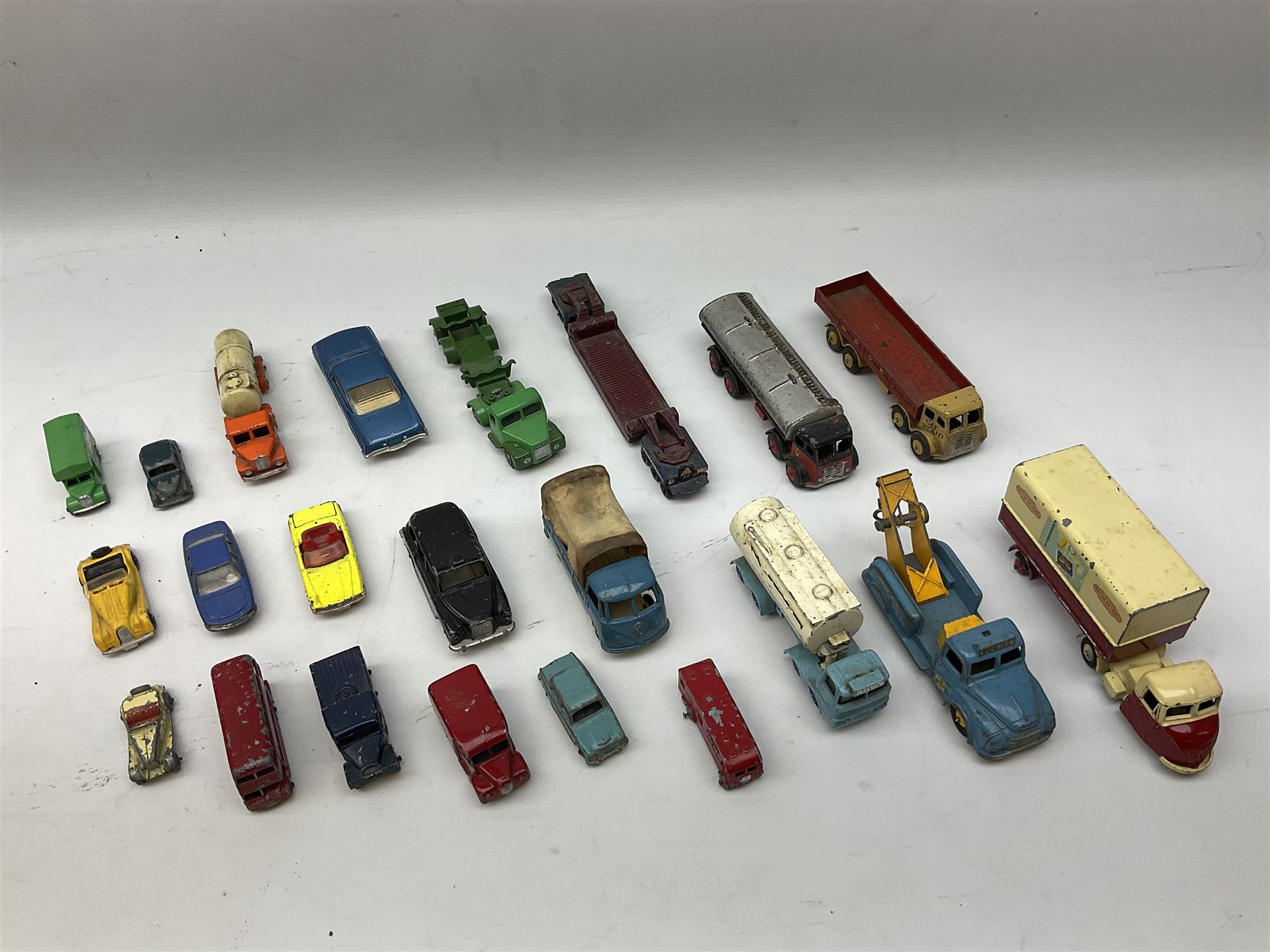 Budgie - five unboxed and playworn die-cast commercial vehicles comprising Scammell Scarab with BR Semi-Trailer, Volkswagen Pick-Up, Towing Tender & Breakdown Truck, Highwayman Transporter No.326 and Routeman Pneumajector No.322; Morestone G&E Wood open lorry and Petrol Tanker; nine early Lesney models; and small quantity of others by various makers