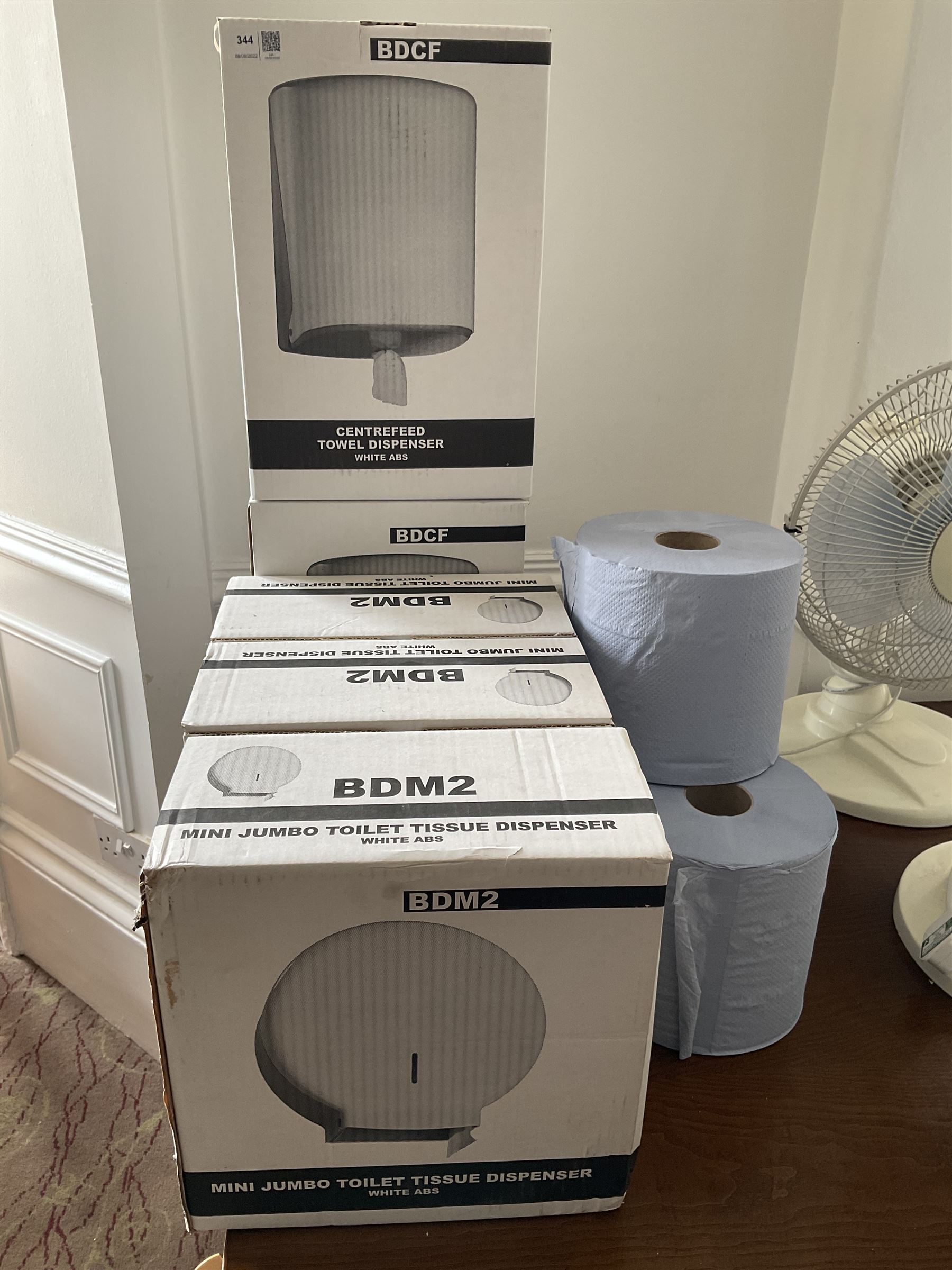 Pair of centrefeed towel dispensers and three mini jumbo toilet tissue dispensers with three blue paper rolls- LOT SUBJECT TO VAT ON THE HAMMER PRICE - To be collected by appointment from The Ambassador Hotel, 36-38 Esplanade, Scarborough YO11 2AY. ALL GOODS MUST BE REMOVED BY WEDNESDAY 15TH JUNE.