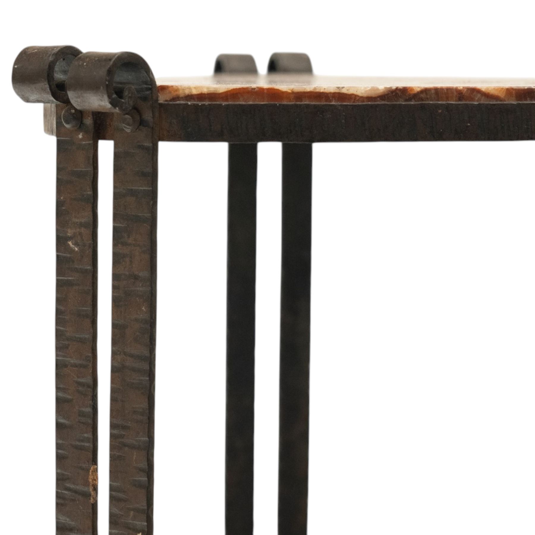 Art Nouveau wrought metal and specimen marble two-tier occasional table, the triangular marble top raised on strap metal uprights with scroll capitals, the under-tier with raised Vitruvian scroll design gallery